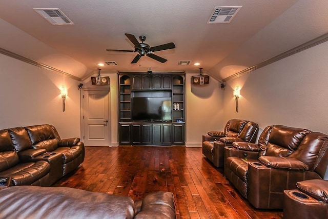 12349 Tramonto Dr, Conroe, TX 77304 - cinema with vaulted ceiling, dark wood finished floors, ceiling fan, ornamental molding, and recessed lighting