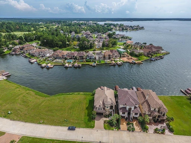 12349 Tramonto Dr, Conroe, TX 77304 - aerial perspective of suburban area with a large body of water