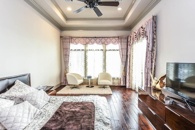 12349 Tramonto Dr, Conroe, TX 77304 - bedroom featuring a raised ceiling, dark wood-type flooring, crown molding, and ceiling fan