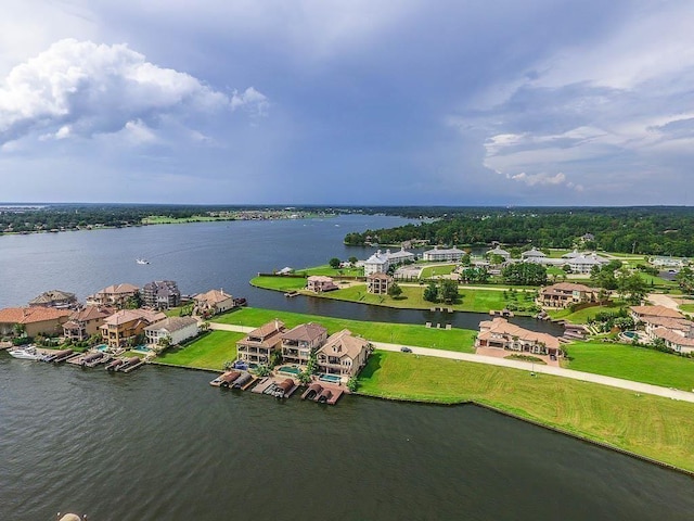 12349 Tramonto Dr, Conroe, TX 77304 - aerial perspective of suburban area with a large body of water