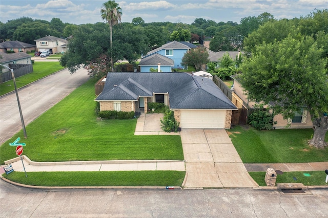 1103 W Brompton Dr, Pearland, TX 77584 - view of front of property featuring concrete driveway, an attached garage, and brick siding