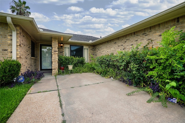 1103 W Brompton Dr, Pearland, TX 77584 - doorway to property with brick siding