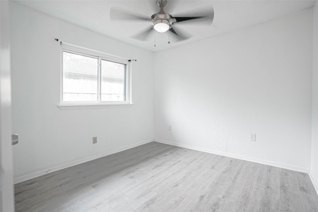 1103 W Brompton Dr, Pearland, TX 77584 - unfurnished room with wood finished floors and a ceiling fan