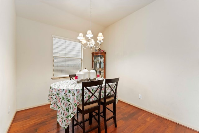 18843 Cove Pointe Dr, Cypress, TX 77433 - dining space with a chandelier and wood finished floors