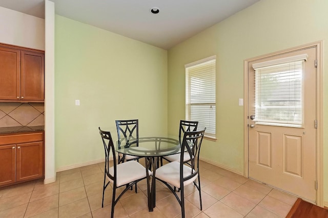 18843 Cove Pointe Dr, Cypress, TX 77433 - dining room featuring light tile patterned floors