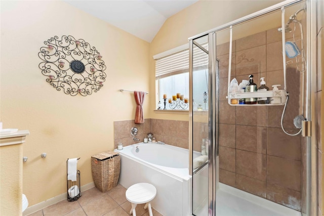 18843 Cove Pointe Dr, Cypress, TX 77433 - bathroom featuring a garden tub, lofted ceiling, a stall shower, and tile patterned flooring