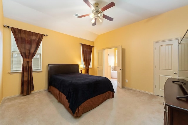 18843 Cove Pointe Dr, Cypress, TX 77433 - bedroom with light colored carpet, lofted ceiling, connected bathroom, and a ceiling fan