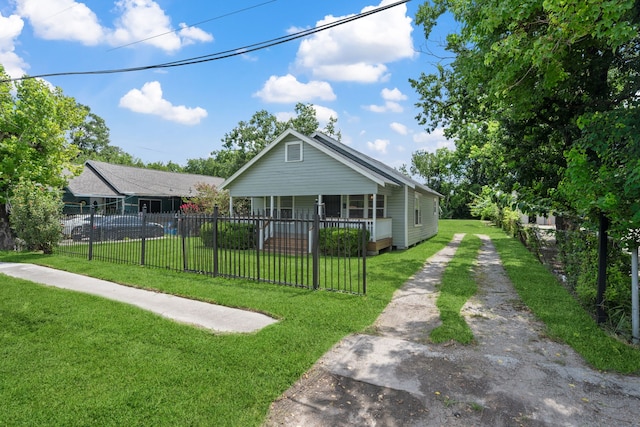 3822 Wipprecht St, Houston, TX 77026 - bungalow-style house with covered porch, driveway, and a fenced front yard
