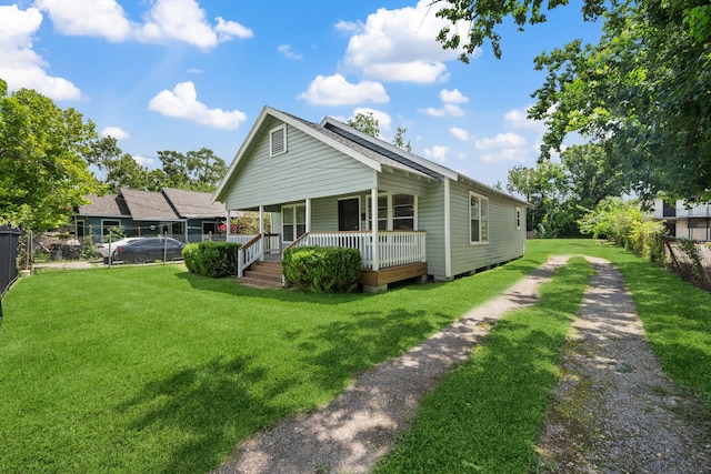 3822 Wipprecht St, Houston, TX 77026 - view of front facade featuring covered porch and driveway