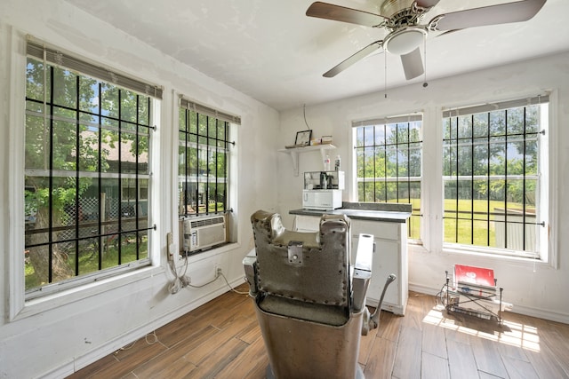 3822 Wipprecht St, Houston, TX 77026 - dining area with wood finished floors, cooling unit, and ceiling fan