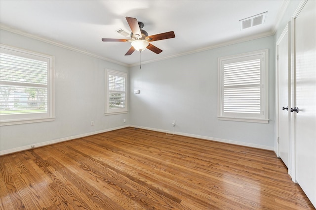 1710 Gardenia Dr, Houston, TX 77018 - unfurnished room with light wood-style flooring, a ceiling fan, and crown molding
