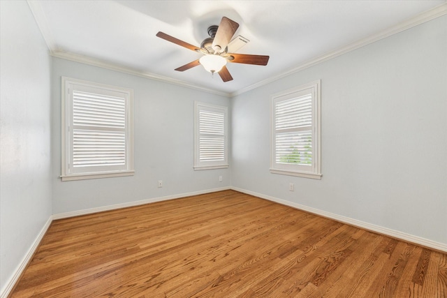 1710 Gardenia Dr, Houston, TX 77018 - spare room with light wood-style flooring, ornamental molding, and a ceiling fan