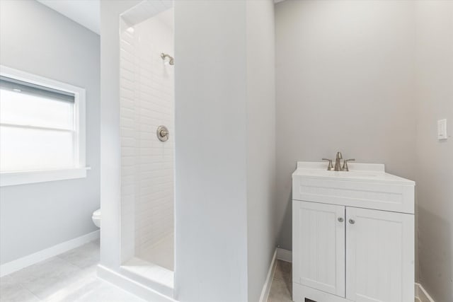1710 Gardenia Dr, Houston, TX 77018 - full bathroom featuring tiled shower, vanity, and tile patterned floors