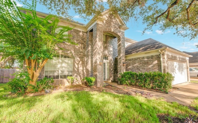 2917 Veva Dr, Pearland, TX 77584 - view of front of property featuring brick siding and a garage