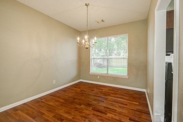 2917 Veva Dr, Pearland, TX 77584 - unfurnished dining area featuring wood finished floors and a chandelier