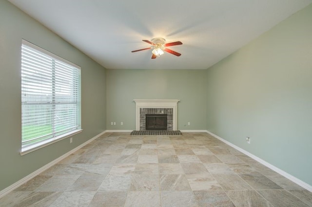 2917 Veva Dr, Pearland, TX 77584 - unfurnished living room with a brick fireplace and a ceiling fan