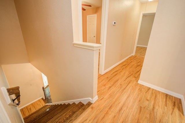 2917 Veva Dr, Pearland, TX 77584 - hallway featuring light wood-type flooring and an upstairs landing