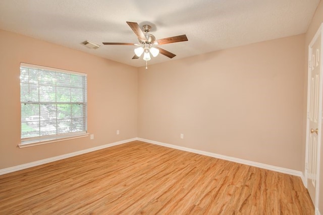 2917 Veva Dr, Pearland, TX 77584 - empty room featuring light wood-type flooring and ceiling fan