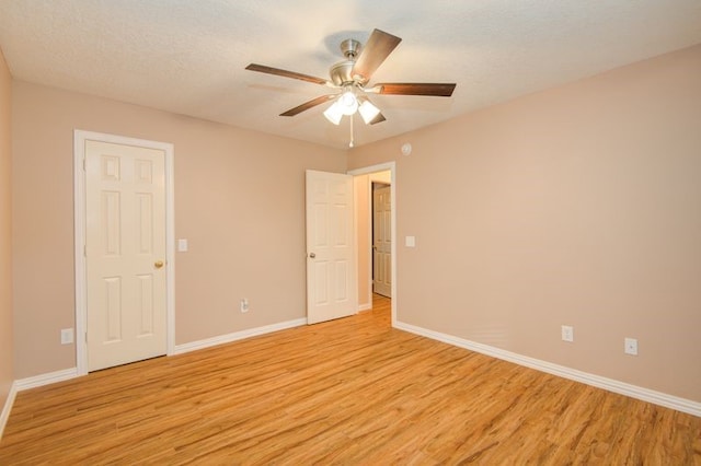 2917 Veva Dr, Pearland, TX 77584 - empty room with light wood-type flooring and ceiling fan