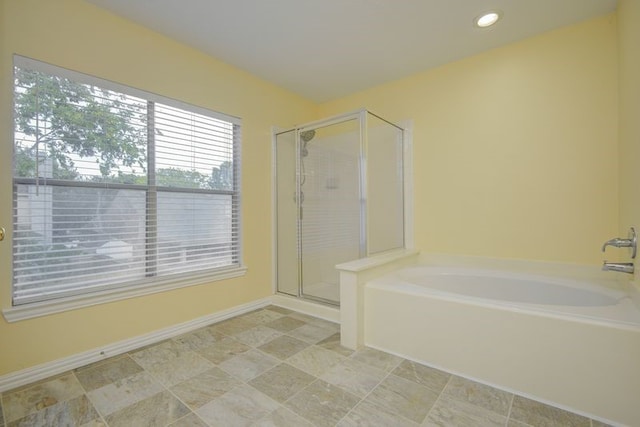 2917 Veva Dr, Pearland, TX 77584 - bathroom with a garden tub, a stall shower, recessed lighting, and tile patterned flooring