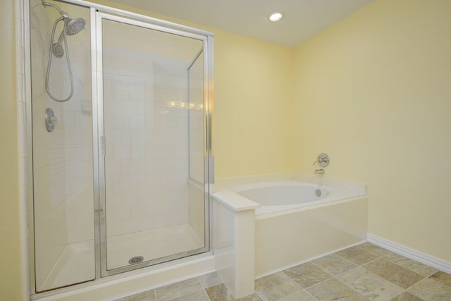2917 Veva Dr, Pearland, TX 77584 - full bathroom featuring a stall shower, a garden tub, and recessed lighting