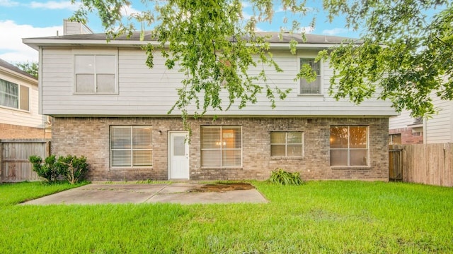 2917 Veva Dr, Pearland, TX 77584 - view of front of house featuring a patio, a fenced backyard, a chimney, and brick siding