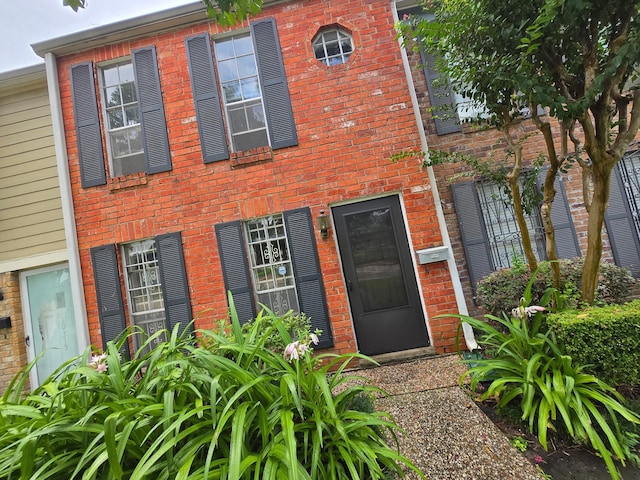 10317 Briar Forest Dr Unit 2/14, Houston, TX 77042 - view of front facade with brick siding