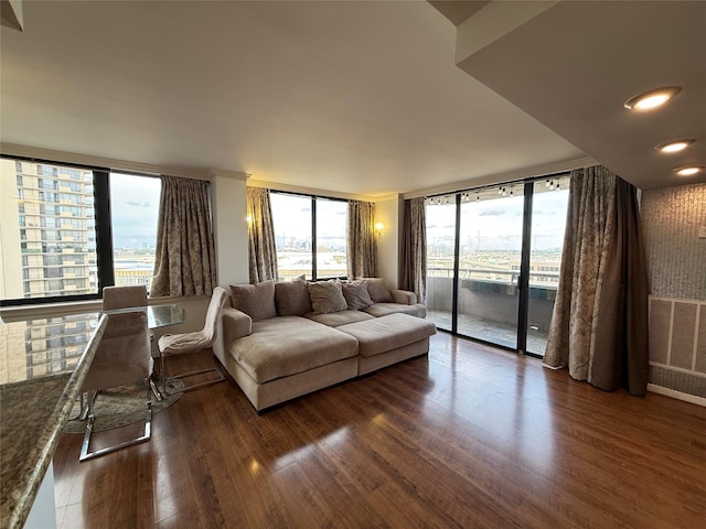 3525 Sage Rd Unit 1204, Houston, TX 77056 - living room featuring dark wood-style floors and plenty of natural light