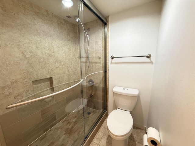 3525 Sage Rd Unit 1204, Houston, TX 77056 - bathroom with a shower stall and tile patterned flooring