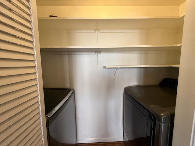 3525 Sage Rd Unit 1204, Houston, TX 77056 - laundry room featuring washing machine and dryer