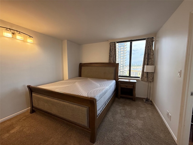 3525 Sage Rd Unit 1204, Houston, TX 77056 - bedroom featuring carpet flooring and baseboards