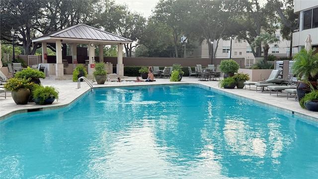 3525 Sage Rd Unit 1204, Houston, TX 77056 - community pool featuring a gazebo and a patio area