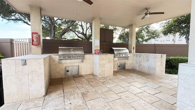 3525 Sage Rd Unit 1204, Houston, TX 77056 - view of patio with ceiling fan and exterior kitchen