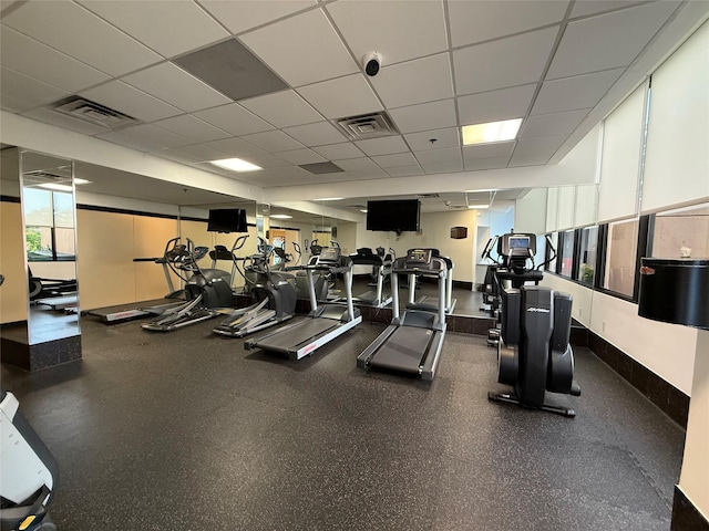 3525 Sage Rd Unit 1204, Houston, TX 77056 - gym featuring a drop ceiling and baseboards