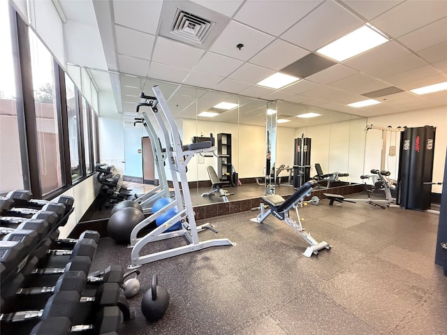 3525 Sage Rd Unit 1204, Houston, TX 77056 - gym featuring a paneled ceiling