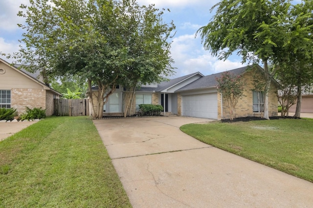 16822 Applecross Ln, Houston, TX 77084 - ranch-style house with brick siding, concrete driveway, and an attached garage