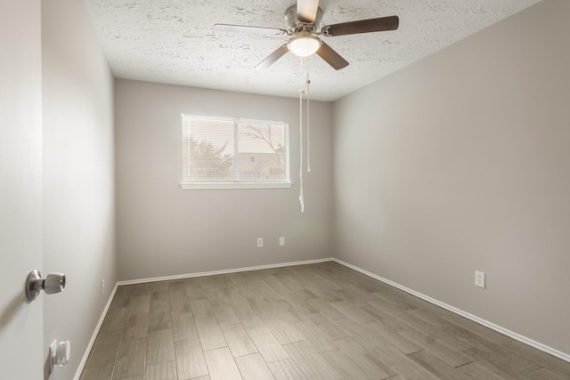 16822 Applecross Ln, Houston, TX 77084 - spare room with ceiling fan, a textured ceiling, and wood finished floors