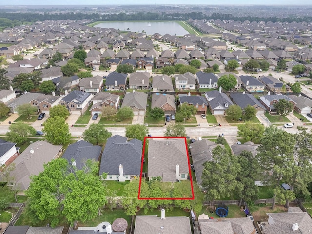 13923 Roanoke Falls Dr, Cypress, TX 77429 - aerial perspective of suburban area featuring property boundaries highlighted and a large body of water