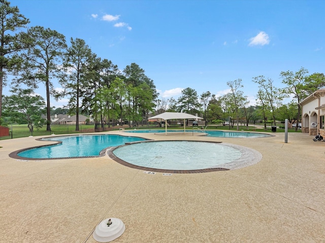 13923 Roanoke Falls Dr, Cypress, TX 77429 - community pool featuring a patio