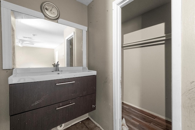 14504 Corpus Christi St Unit 4, Houston, TX 77015 - bathroom with vanity, wood finished floors, and a ceiling fan