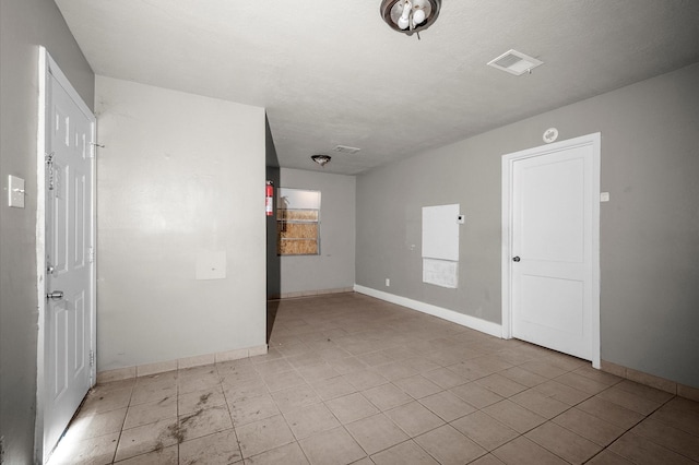 14504 Corpus Christi St Unit 4, Houston, TX 77015 - empty room with light tile patterned floors