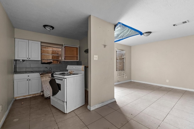 14504 Corpus Christi St Unit 4, Houston, TX 77015 - kitchen with white range with electric cooktop, white cabinetry, backsplash, open shelves, and a textured ceiling