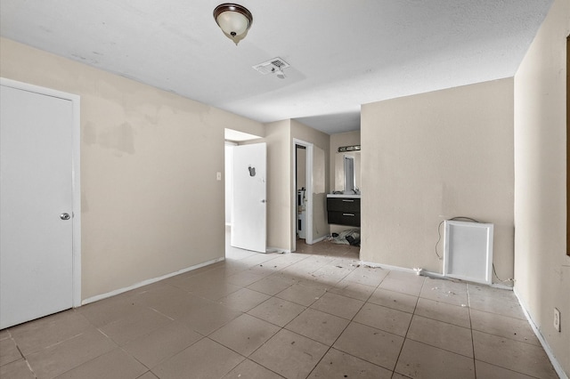 14504 Corpus Christi St Unit 4, Houston, TX 77015 - tiled empty room with baseboards