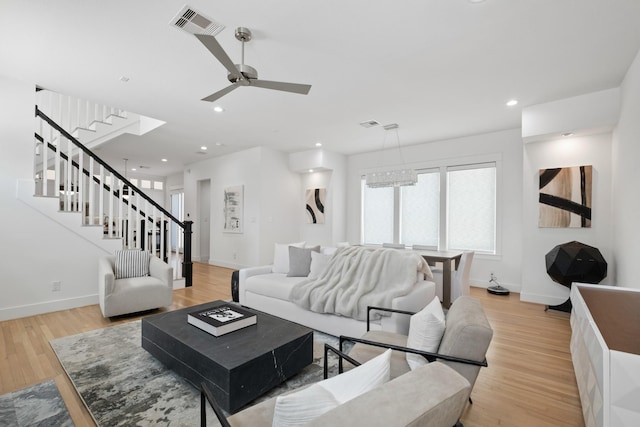 1405 Indiana St Unit B, Houston, TX 77006 - living area with stairway, light wood-type flooring, a ceiling fan, and recessed lighting