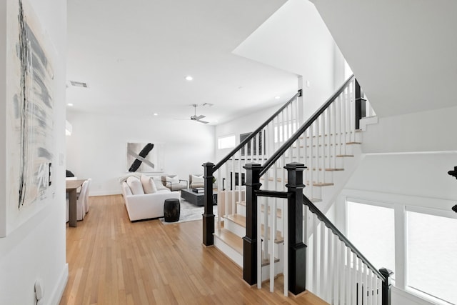 1405 Indiana St Unit B, Houston, TX 77006 - stairs with a ceiling fan, wood finished floors, and recessed lighting