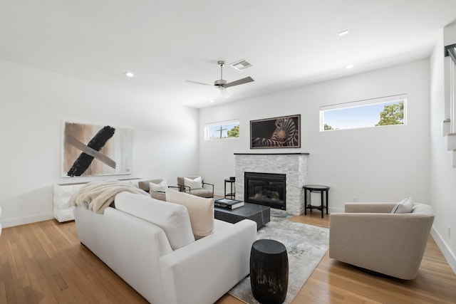 1405 Indiana St Unit B, Houston, TX 77006 - living room with light wood-style floors, a fireplace, recessed lighting, and ceiling fan