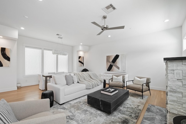 1405 Indiana St Unit B, Houston, TX 77006 - living room with wood finished floors, ceiling fan, recessed lighting, and a fireplace