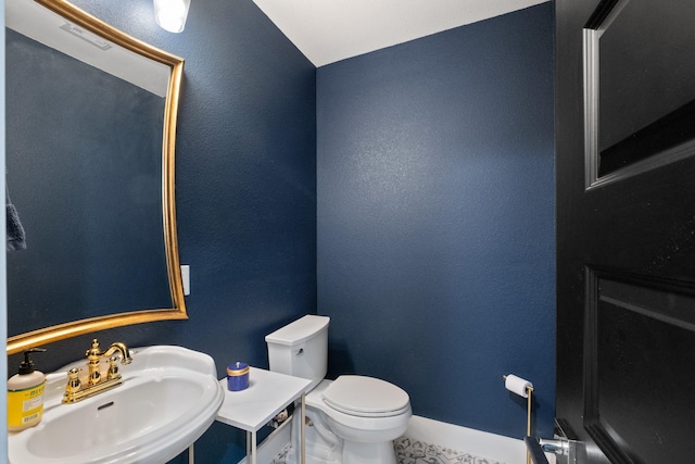1405 Indiana St Unit B, Houston, TX 77006 - bathroom featuring a sink and tile patterned floors