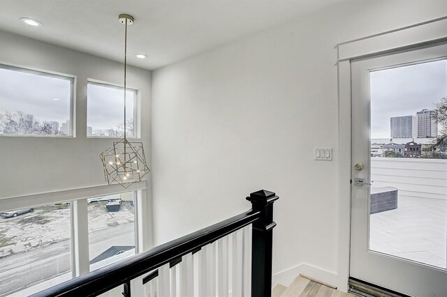 1405 Indiana St Unit B, Houston, TX 77006 - hallway with a chandelier, an upstairs landing, and recessed lighting