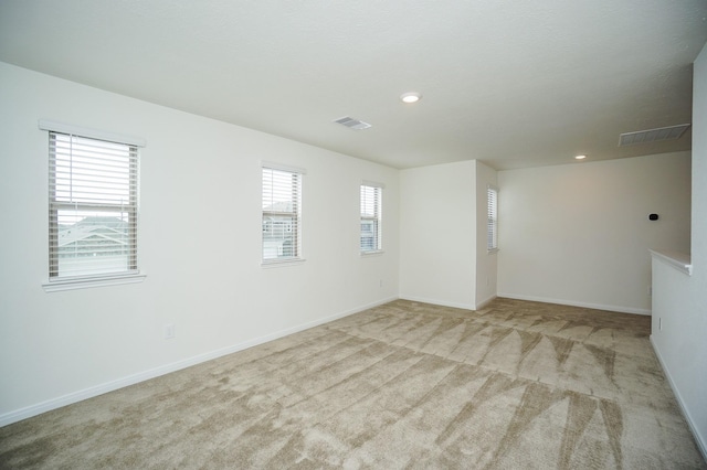 4615 Sabine Creek Way, Katy, TX 77449 - carpeted empty room featuring baseboards and recessed lighting